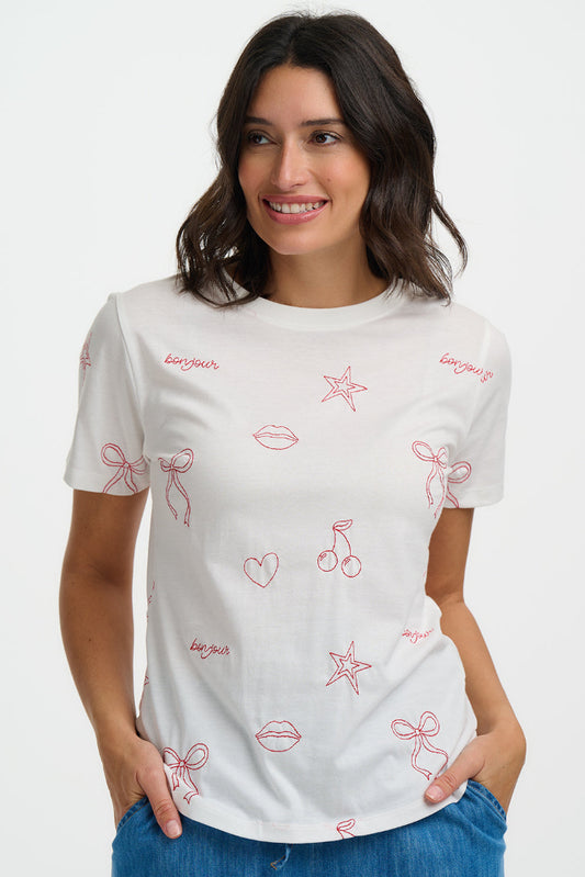 Woman wearing a white t-shirt with red graphics and text on a white background