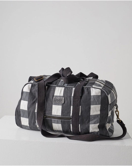 Side view of Kip & Co Black & White Gingham Duffle Bag