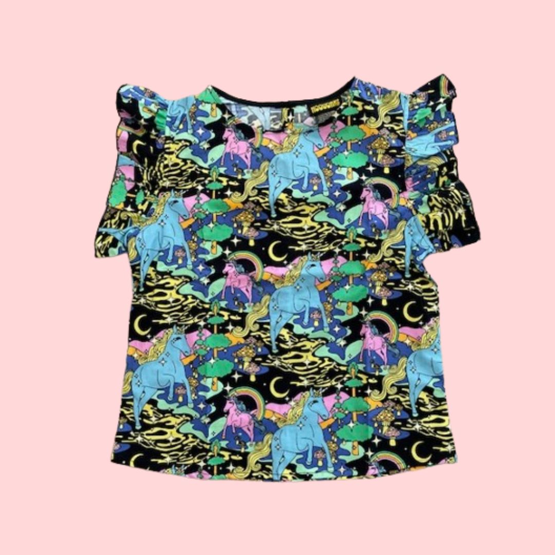 Flatlay of Nooworks Unicorn Ruffle Top