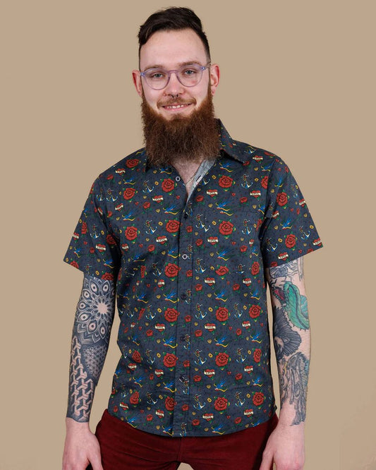 Model is wearing Run and Fly Retro Tattoo Print Shirt.