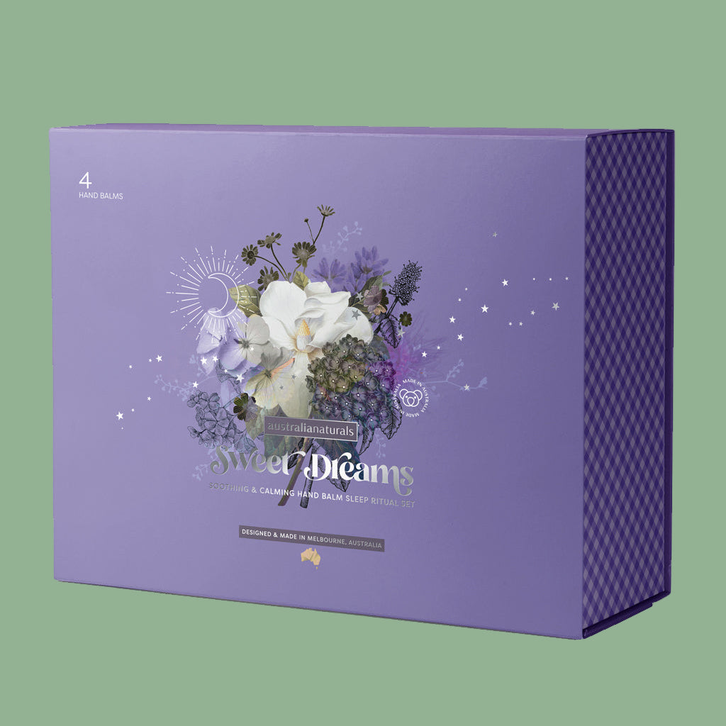 Purple packaging box with floral design and text on a white background