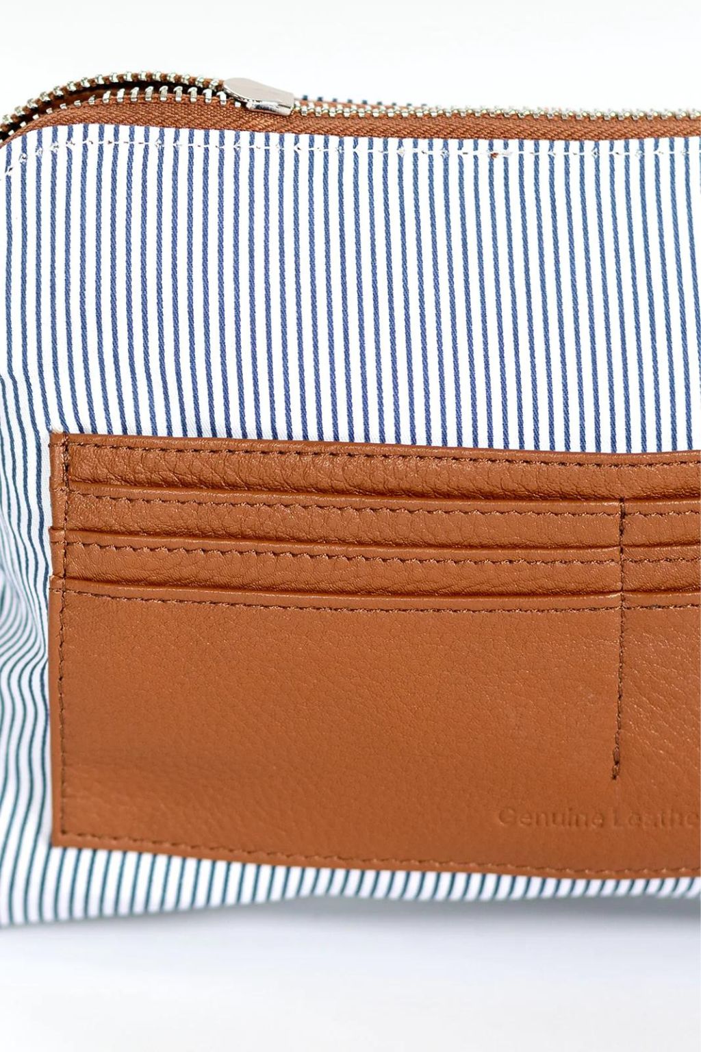 Inside Pocket of Hoopla Mini Cross Body Slouch Bag in Tan