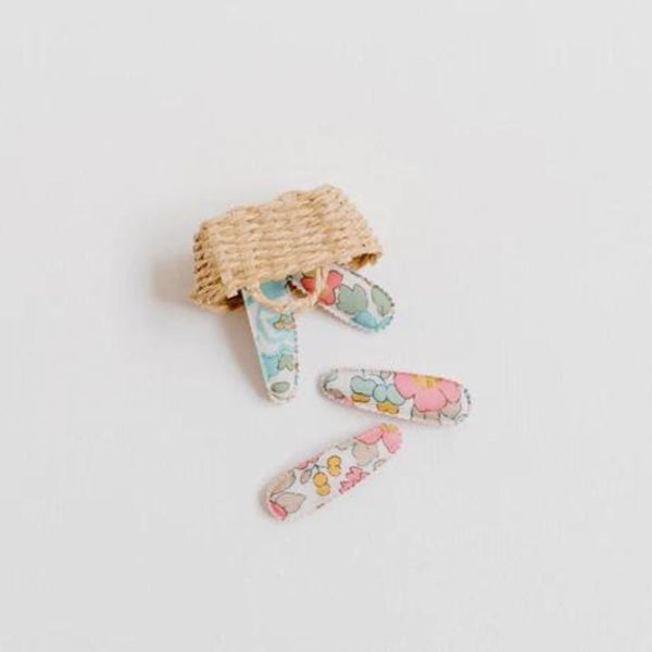 Flat lay of Josie Joan's Mini Hair Clips in Poppy