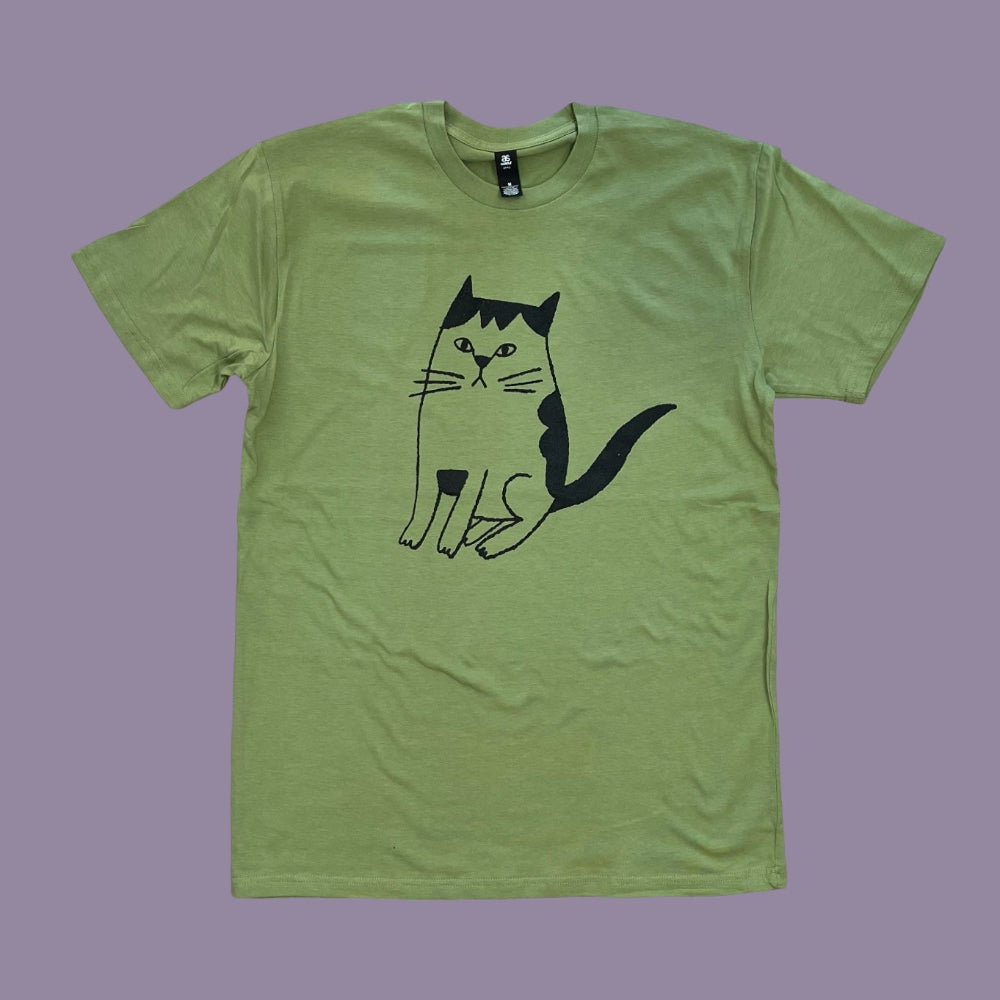 Green t-shirt with a black cat illustration on a purple background