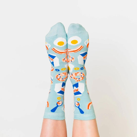 Yellow Owl Workshop Breakfast Socks in Small. Worn by foot model. 