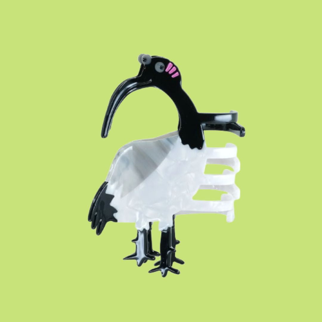 Bea Bellingham's Ibis Bin Chicken Hair Claw on a lime green background