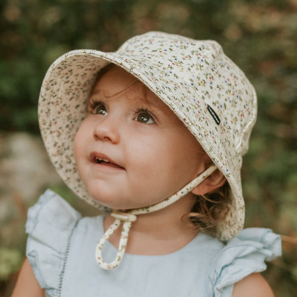 Front view of Bedhead Charlotte Bucket Hat for 1-2 years worn by a young model