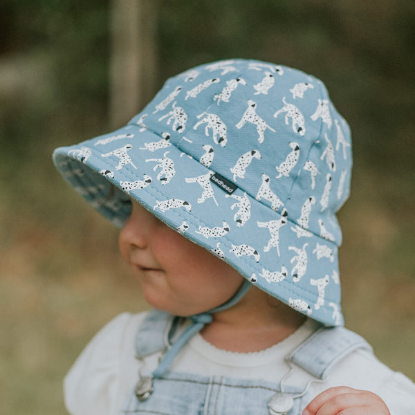 Side view of Bedhead Dalmatian Bucket Hat for 1-2 years worn by a young model