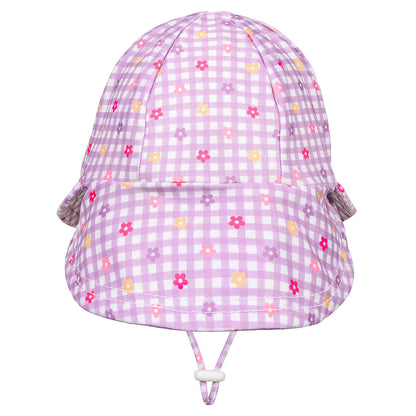 A light purple and white gingham swim hat with a small multicolour floral print, featuring a chin strap with a white toggle.