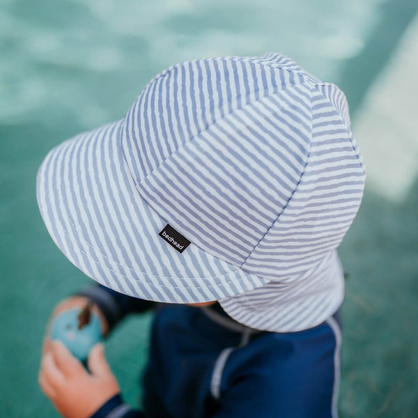 Side view of Bedhead Stevie Stripe Swim Legionnaire Hat worn by a young model