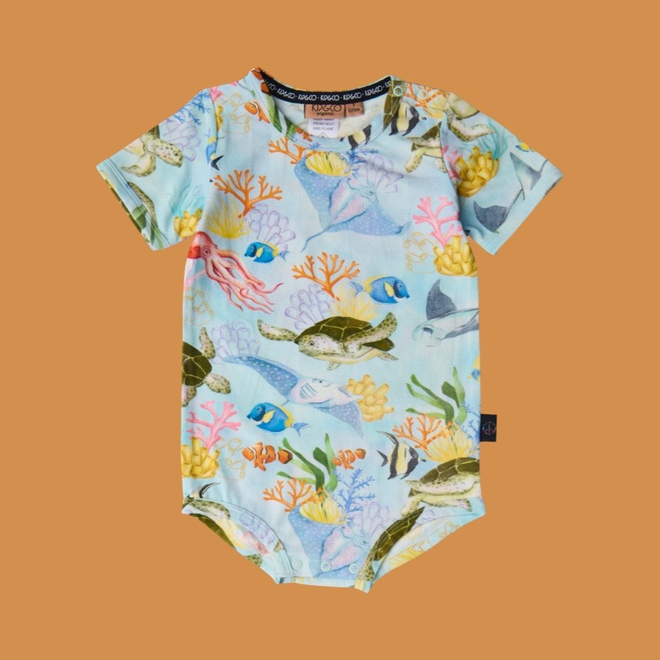 Kip & Co Reef Life Short Sleeve Romper
- a child's onesie with sea-themed print on a orange background