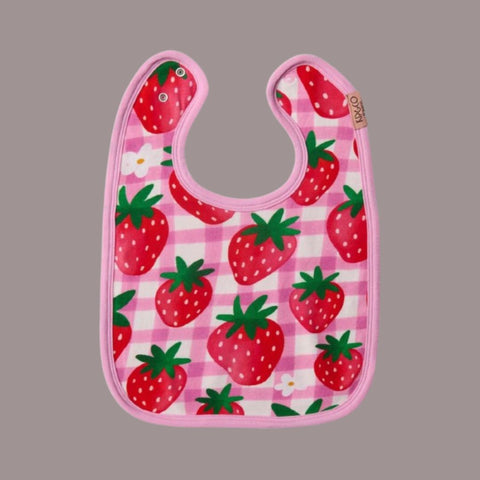 Product image of Kip & Co Strawberry Jam Bib featuring strawberries with a pink gingham background with pink trim.