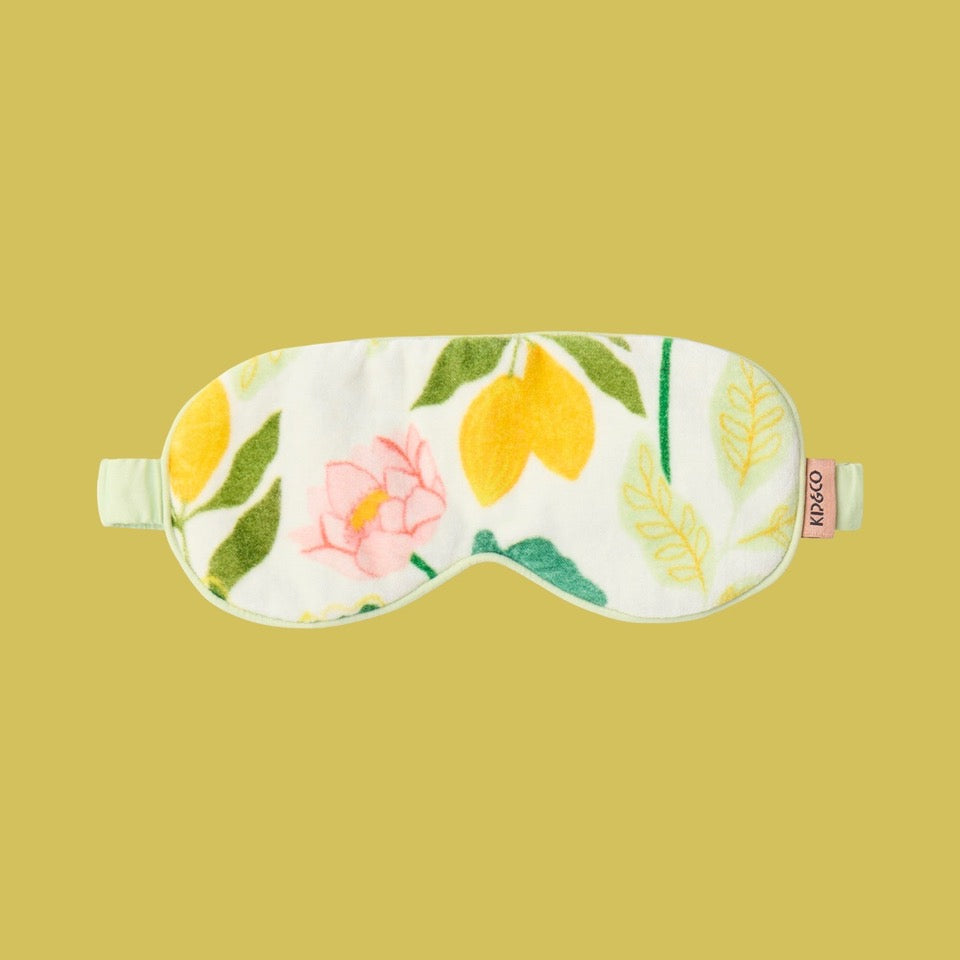 Kip & Co Wander Velvet Eye Mask - Floral and lemon patterned eye mask on a yellow background