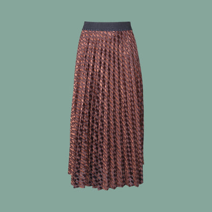 Brown metallic textured pattern skirt on a green background
