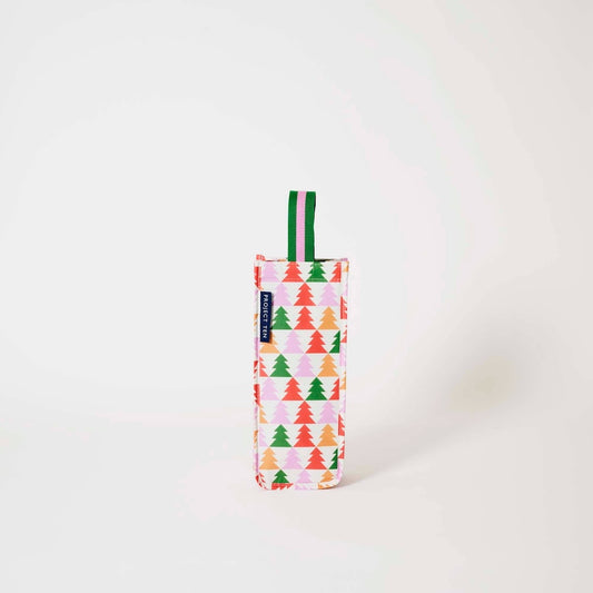 Project Ten Holiday Cheers Wine Bag - A vertical reusable wine bag with a colourful Christmas tree pattern on a white background, featuring a green and pink striped carrying loop at the top and a blue side tag with white text.