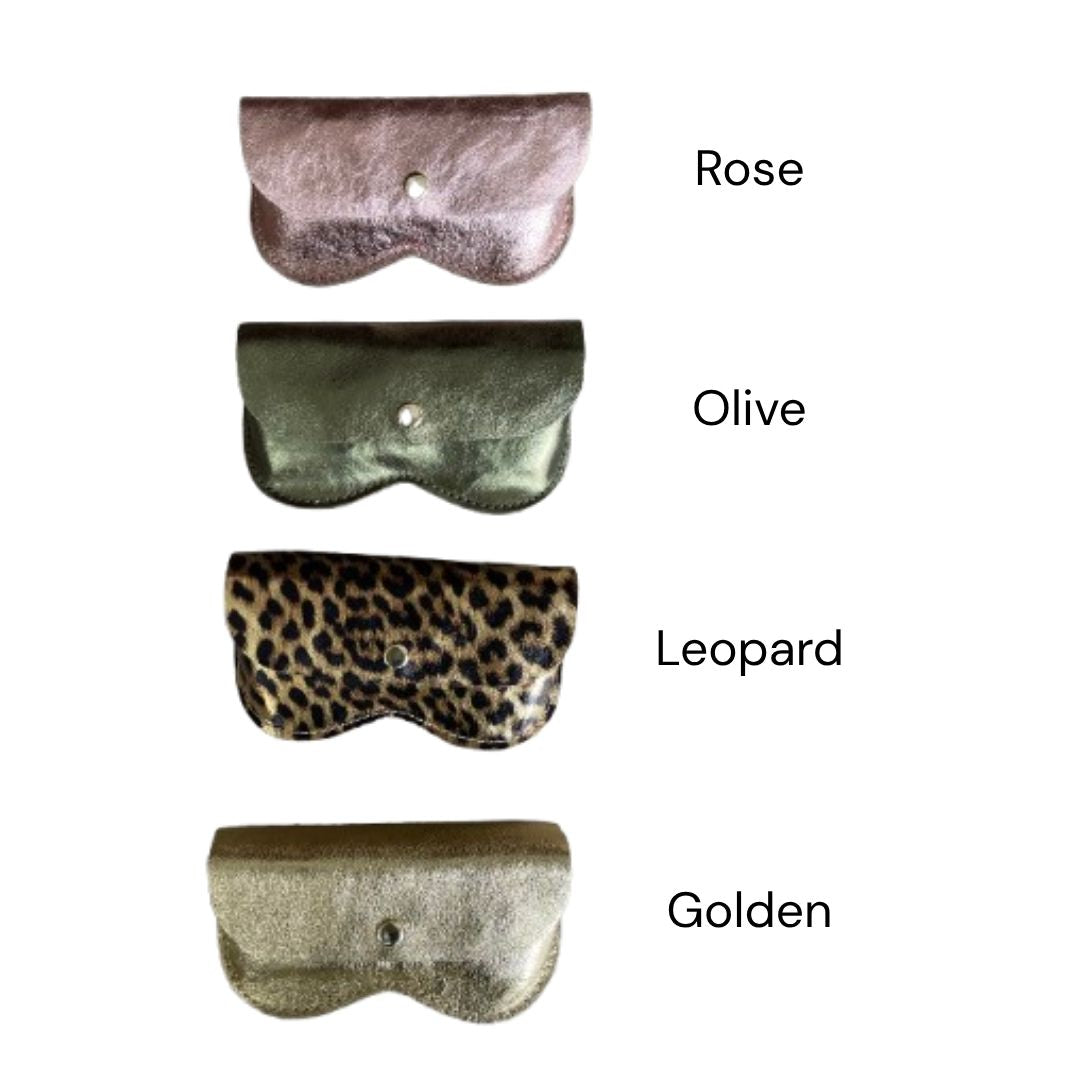 Four textured leather glasses cases shown vertically on a white background, each labeled with a color name: Rose, Olive, Leopard, and Golden. The top pouch is a dusty rose color, the second is olive green, the third has a leopard print pattern, and the bottom one is a metallic golden-beige tone.