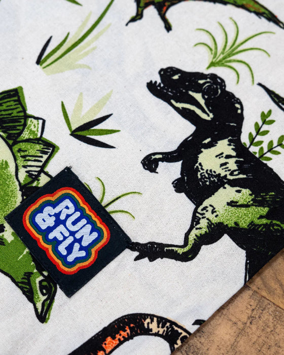 Close up of Run & Fly Logo on the Run and Fly Natural Dino Tote Bag