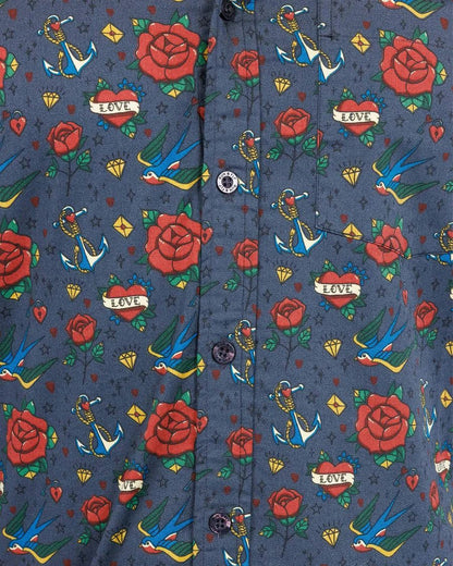 Close up of the button details on Run and Fly Retro Tattoo Print Shirt.